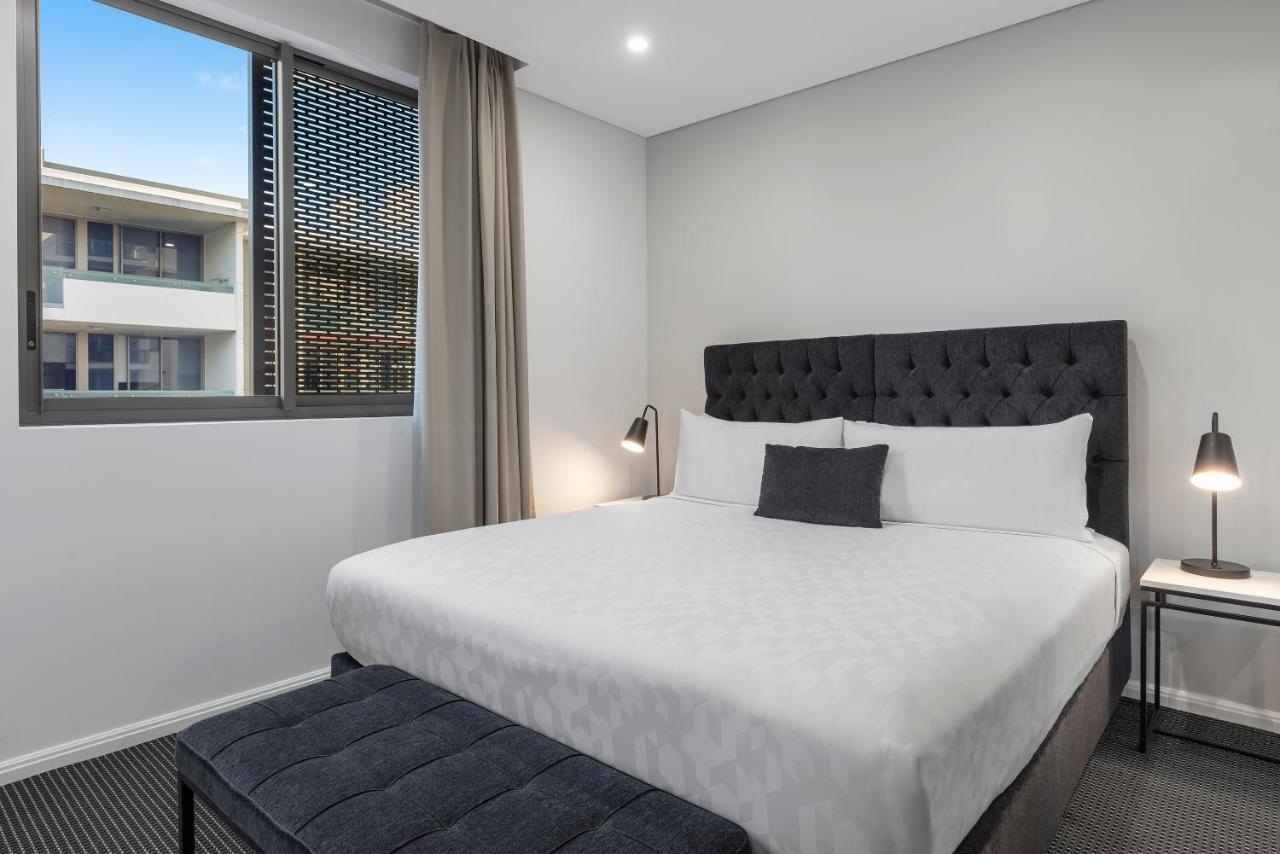 Meriton Suites North Ryde Sydney Eksteriør bilde A bedroom at the hotel